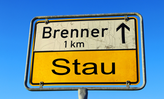 Sign with traffic jam at Brenner Austria Italy