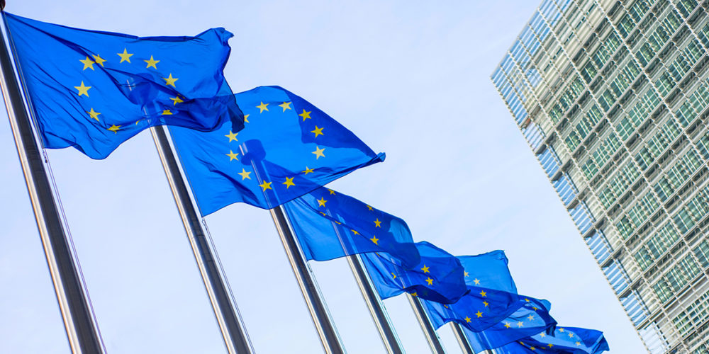 European Union flags in front of the Berlaymont building