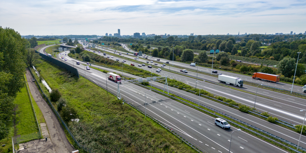 Traffic on highway with cars.