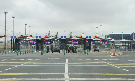 UK border control at Calais France , armed security guards searching vehicles