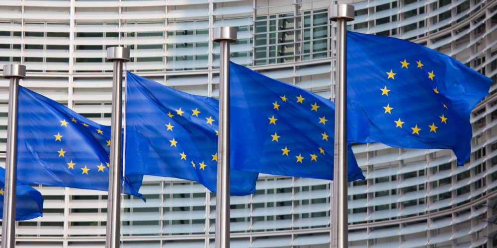 Row of European Union flags waving in the wind – Europa