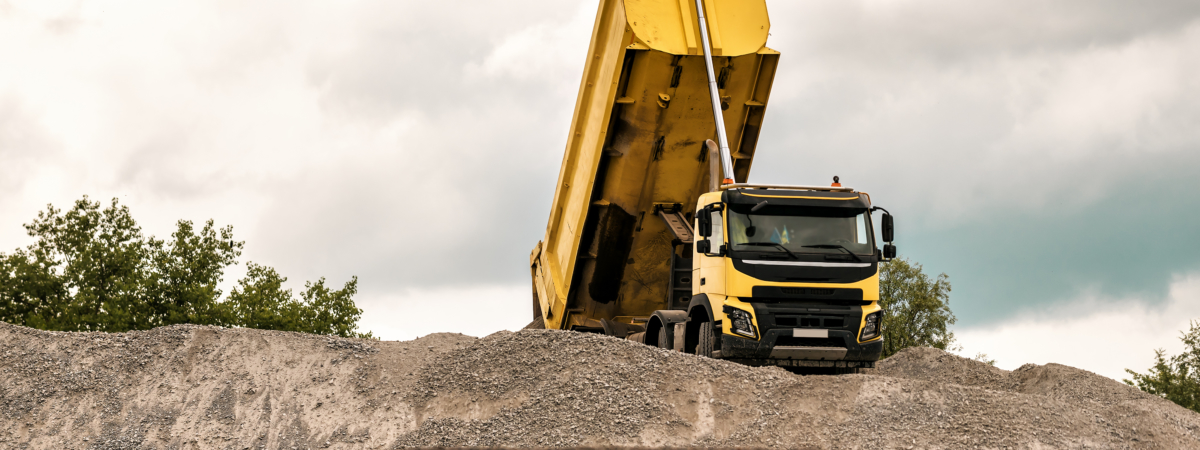 yellow truck with raised body